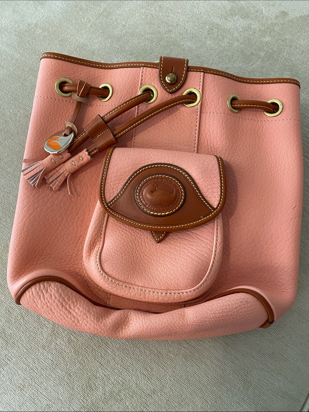 Dooney & Bourke Pink Pebble Leather Drawstring Bucket Bag with Tan Trim